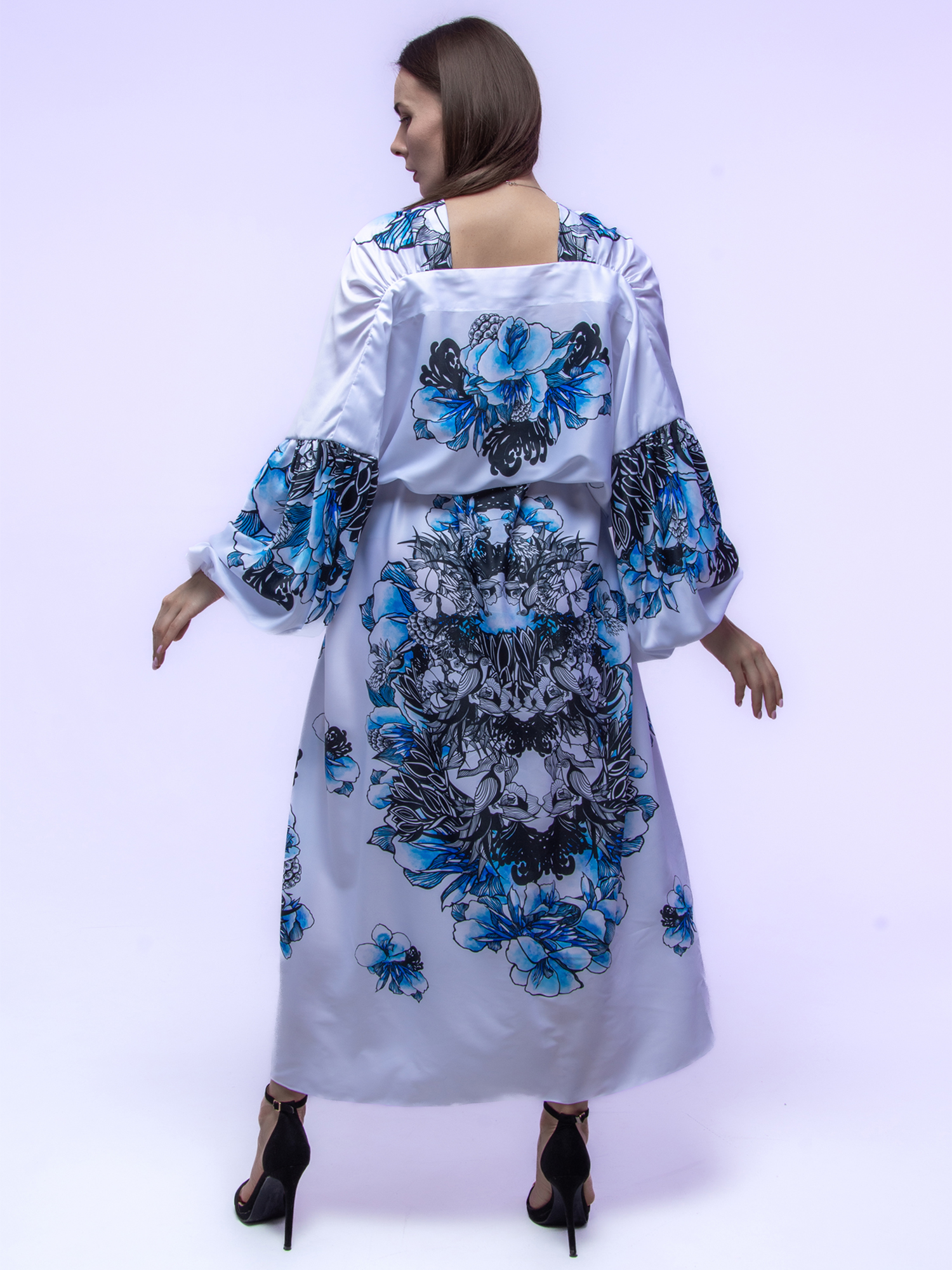 Long white blue dress with flowers in ethno style